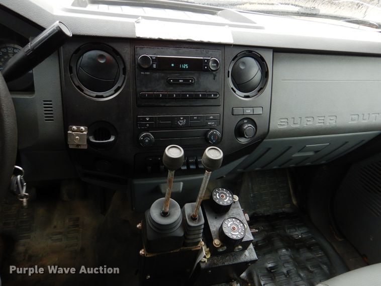 image for item DH8130 2012 Ford F550 Super Duty XL  Crew Cab flatbed truck