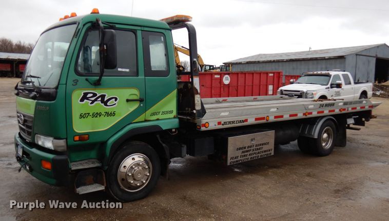 image for item HR9051 2010 Nissan 2300LP  rollback truck