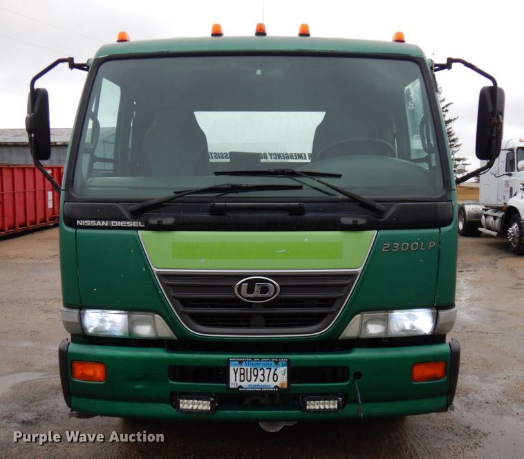 image for item HR9051 2010 Nissan 2300LP  rollback truck