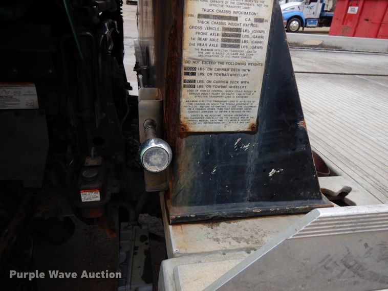 image for item HR9051 2010 Nissan 2300LP  rollback truck