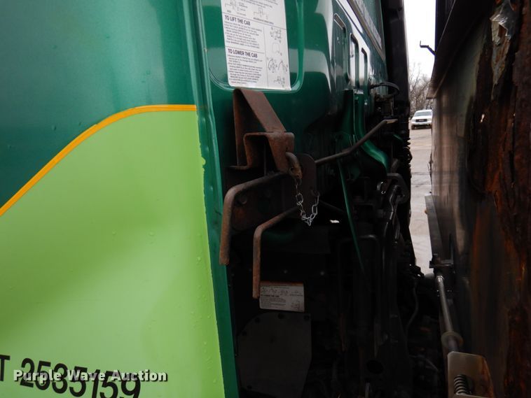 image for item HR9051 2010 Nissan 2300LP  rollback truck