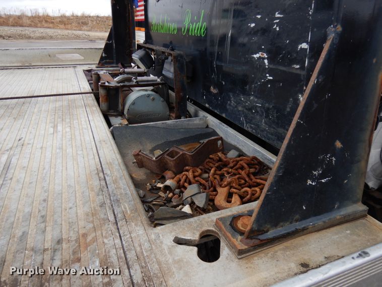 image for item HR9051 2010 Nissan 2300LP  rollback truck