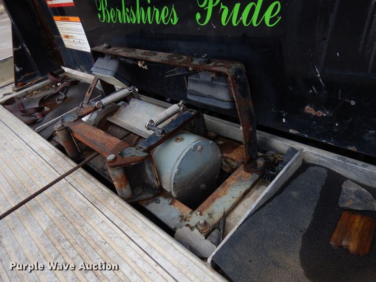 image for item HR9051 2010 Nissan 2300LP  rollback truck