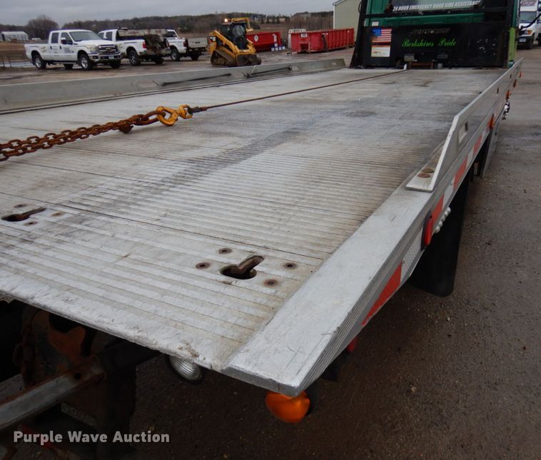 image for item HR9051 2010 Nissan 2300LP  rollback truck