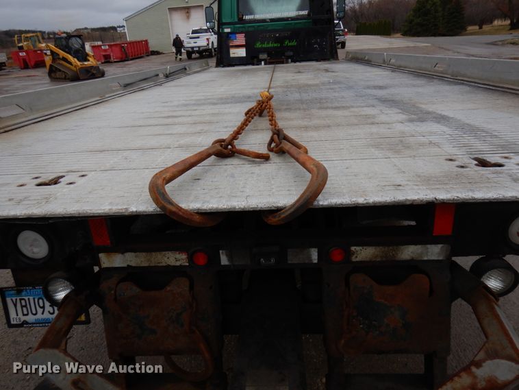 image for item HR9051 2010 Nissan 2300LP  rollback truck