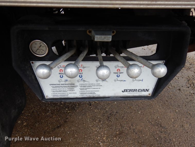 image for item HR9051 2010 Nissan 2300LP  rollback truck