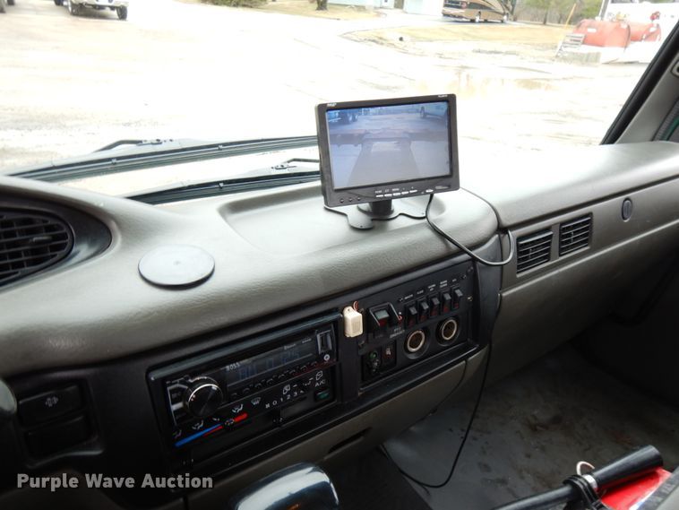 image for item HR9051 2010 Nissan 2300LP  rollback truck