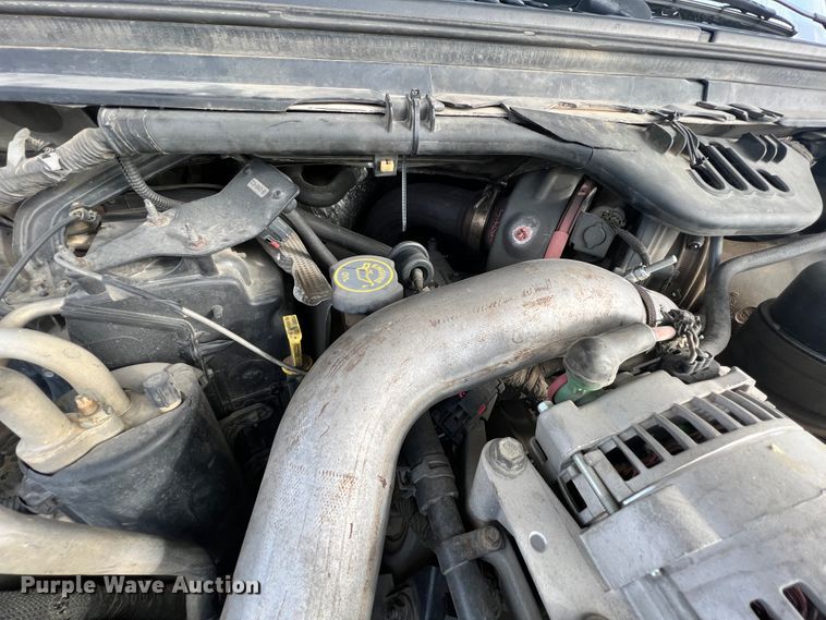 image for item ID9623 2005 Ford F550 Super Duty XLT  Crew Cab flatbed truck