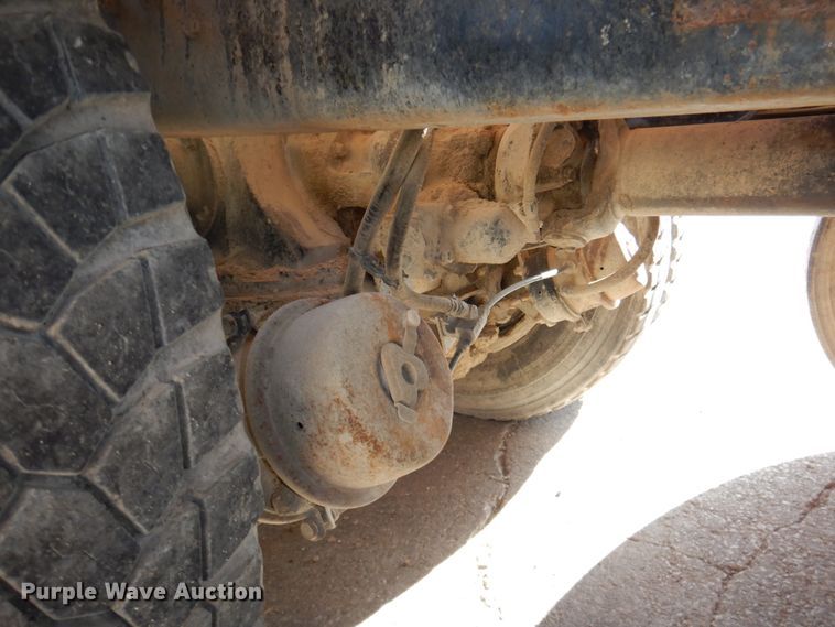 image for item DN2560 2000 Mack DM690S  ready mix truck