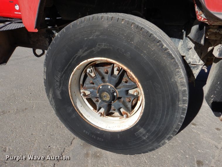 image for item DN2560 2000 Mack DM690S  ready mix truck