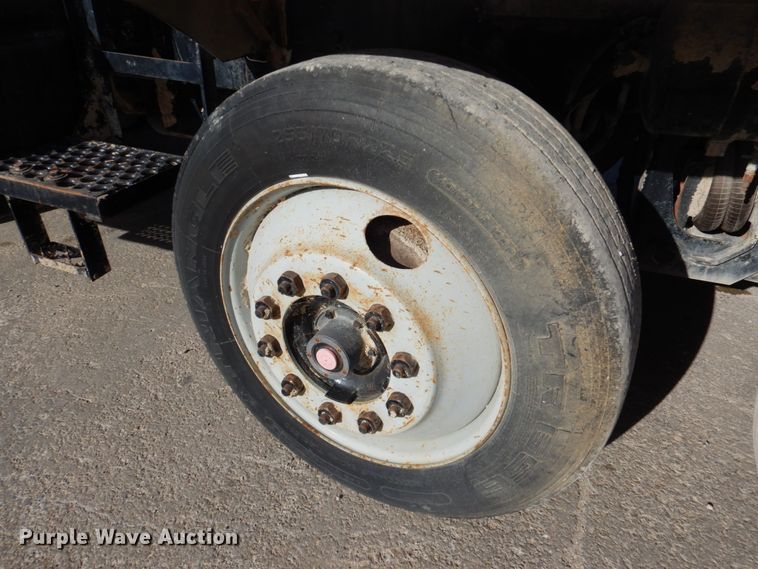 image for item DN2560 2000 Mack DM690S  ready mix truck