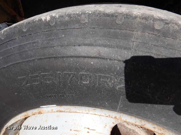 image for item DN2560 2000 Mack DM690S  ready mix truck