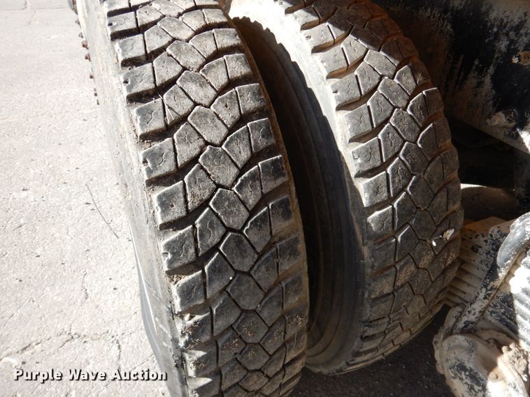 image for item DN2560 2000 Mack DM690S  ready mix truck