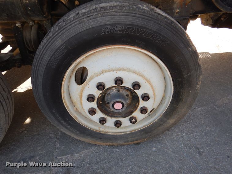 image for item DN2560 2000 Mack DM690S  ready mix truck