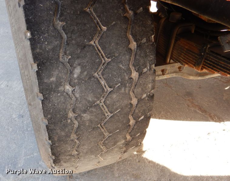 image for item DN2560 2000 Mack DM690S  ready mix truck