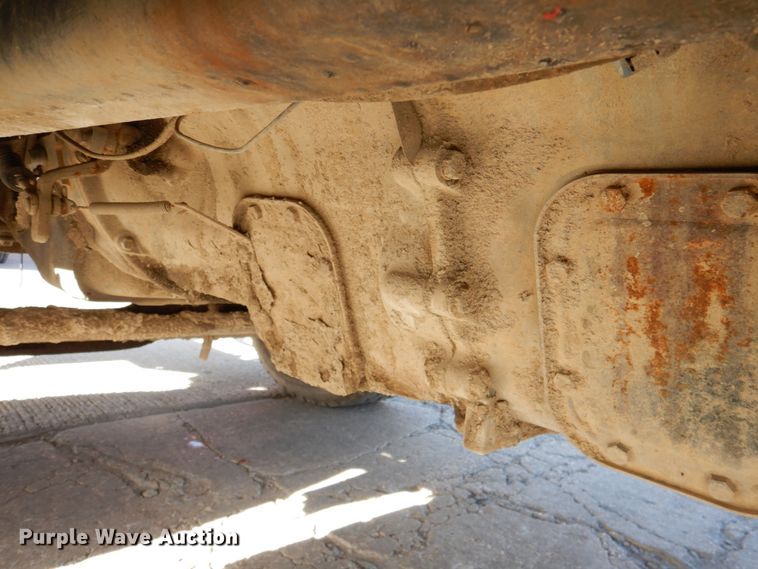 image for item DN2563 2000 Mack DM690S  ready mix truck