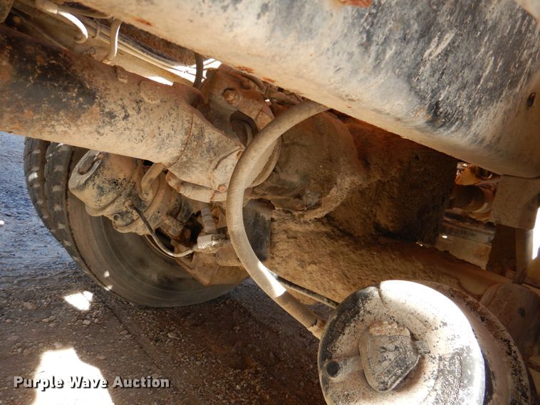 image for item DN2563 2000 Mack DM690S  ready mix truck