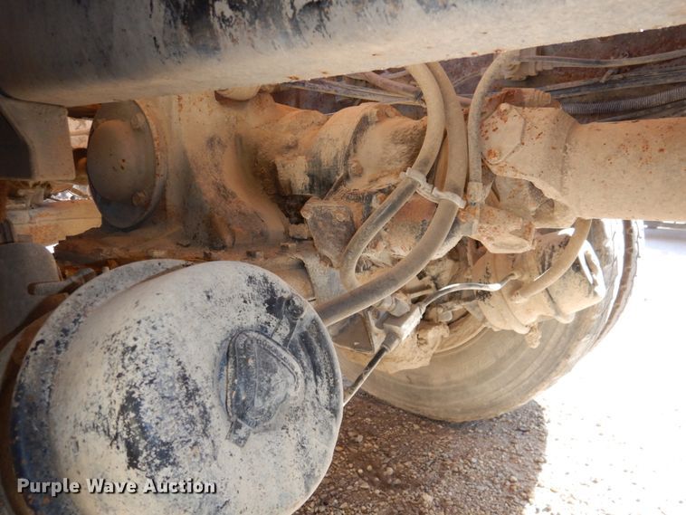 image for item DN2563 2000 Mack DM690S  ready mix truck