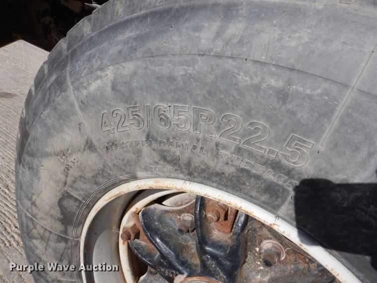 image for item DN2563 2000 Mack DM690S  ready mix truck