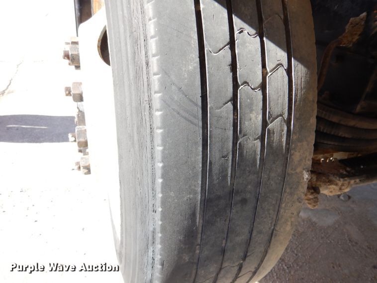 image for item DN2563 2000 Mack DM690S  ready mix truck