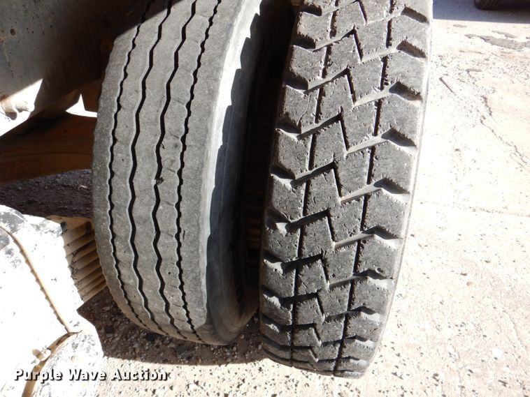 image for item DN2563 2000 Mack DM690S  ready mix truck