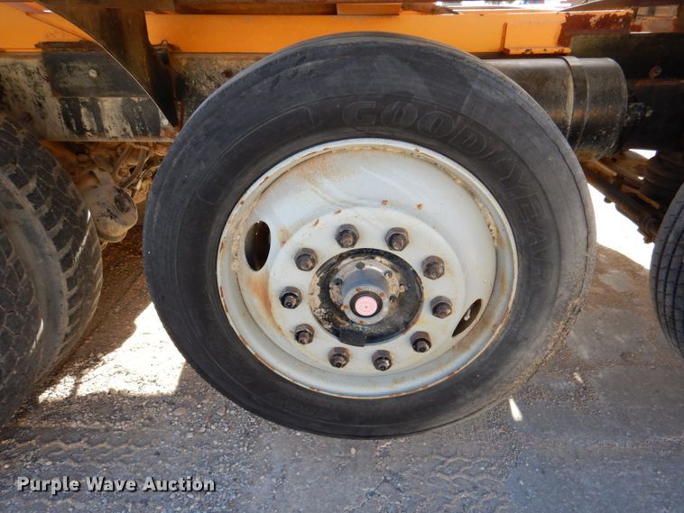 image for item DN2563 2000 Mack DM690S  ready mix truck