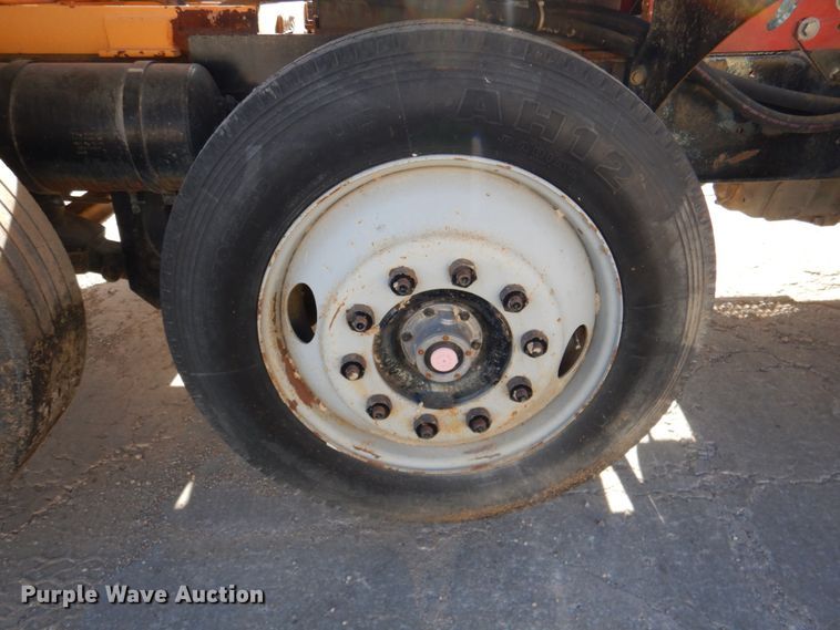 image for item DN2563 2000 Mack DM690S  ready mix truck