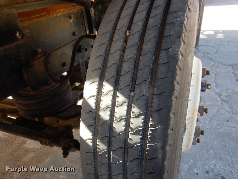 image for item DN2563 2000 Mack DM690S  ready mix truck