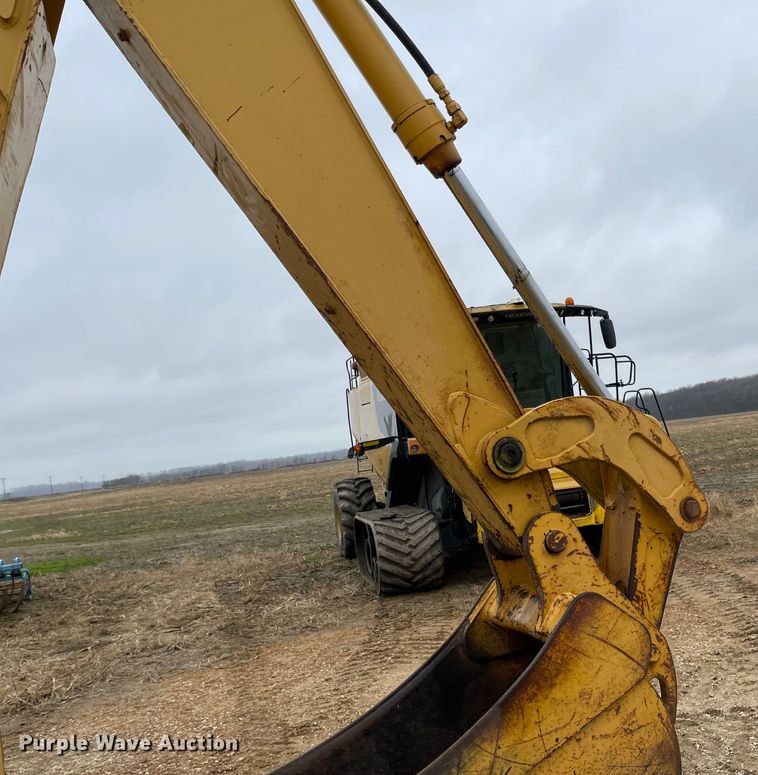 image for item IJ9565 1998 John Deere 310E  backhoe