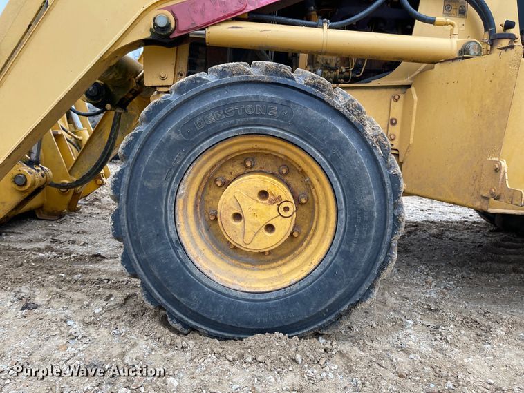 image for item IJ9565 1998 John Deere 310E  backhoe