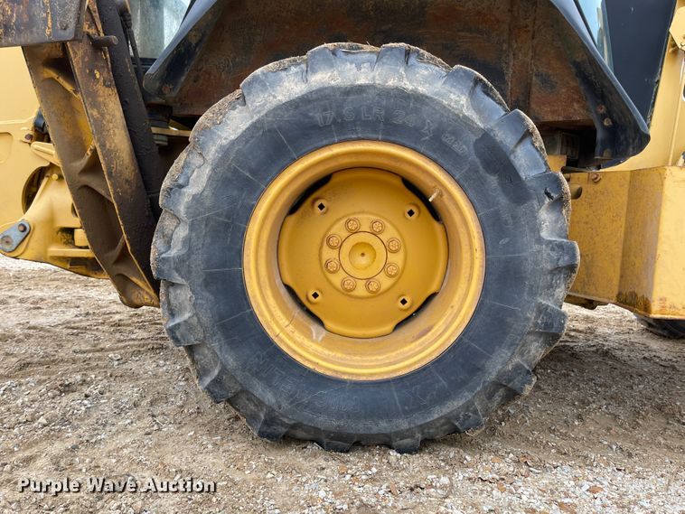 image for item IJ9565 1998 John Deere 310E  backhoe