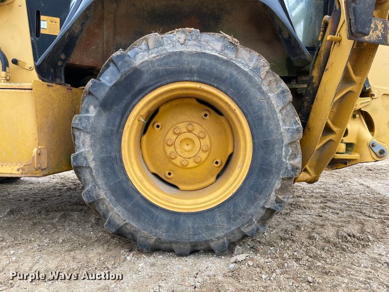 image for item IJ9565 1998 John Deere 310E  backhoe