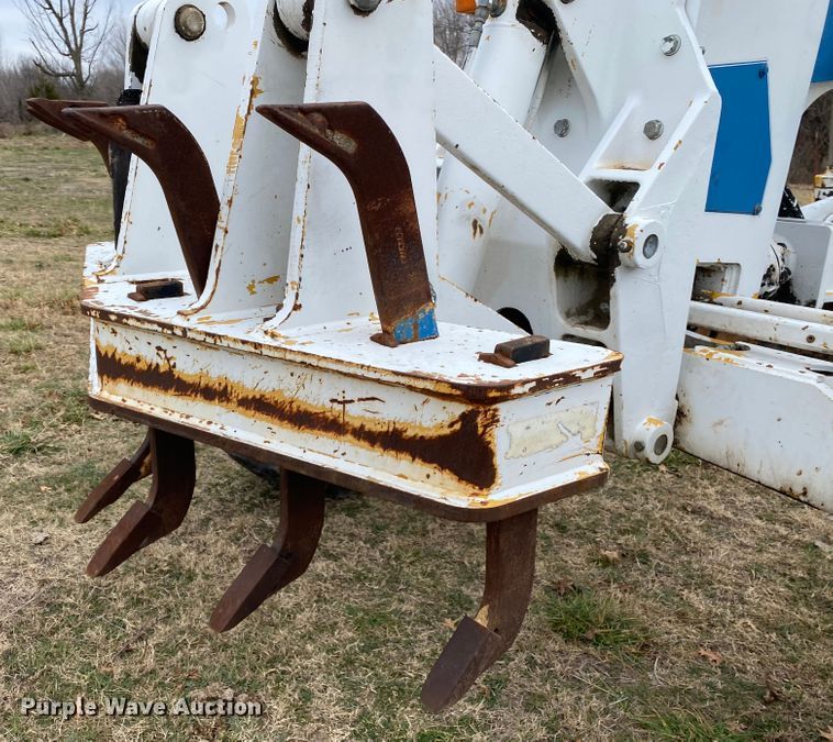 image for item JN9146 2000 John Deere 770C  motor grader