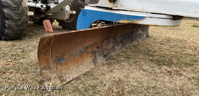 image for item JN9146 2000 John Deere 770C  motor grader