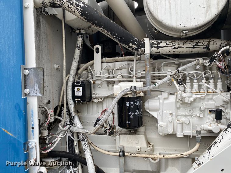 image for item JN9146 2000 John Deere 770C  motor grader