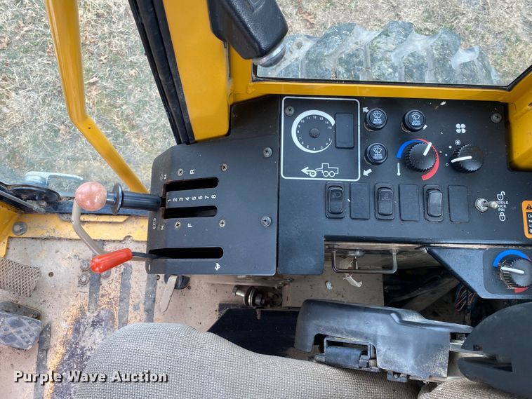 image for item JN9146 2000 John Deere 770C  motor grader