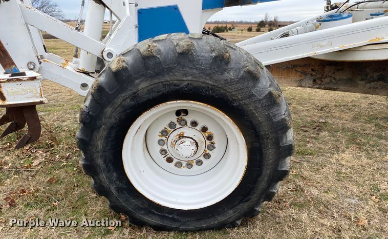 image for item JN9146 2000 John Deere 770C  motor grader