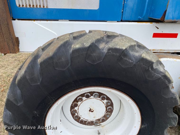 image for item JN9146 2000 John Deere 770C  motor grader