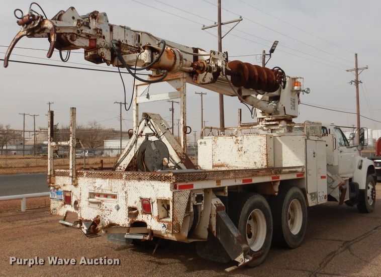 image for item DJ8897 1995 Ford FT900  digger derrick truck