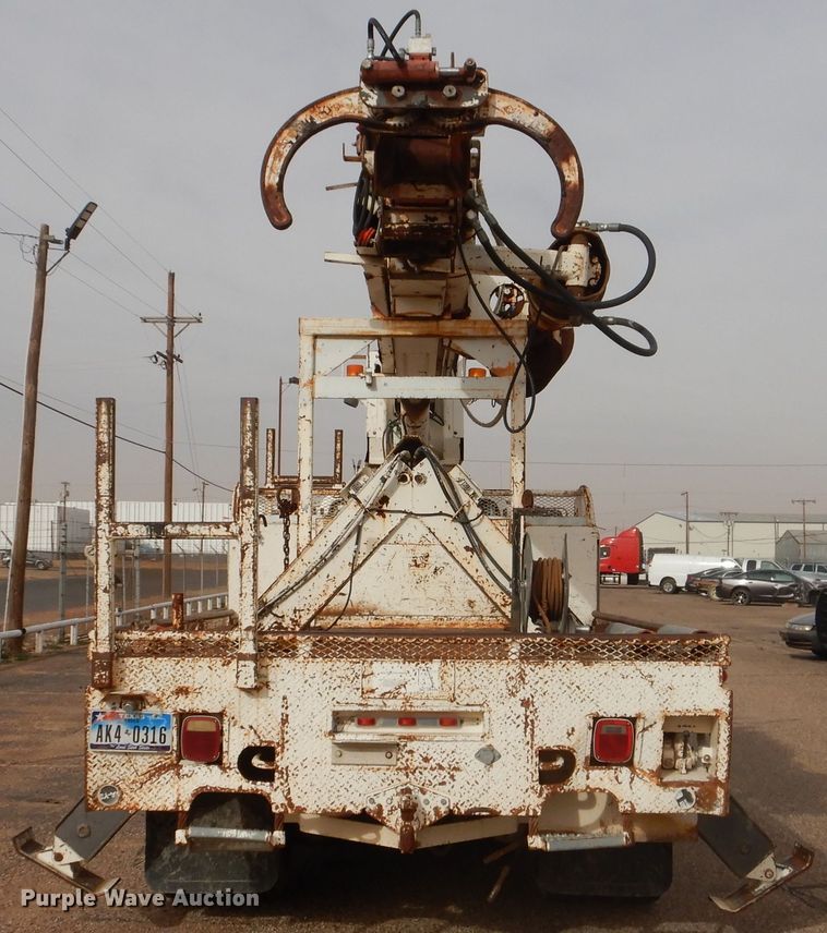 image for item DJ8897 1995 Ford FT900  digger derrick truck