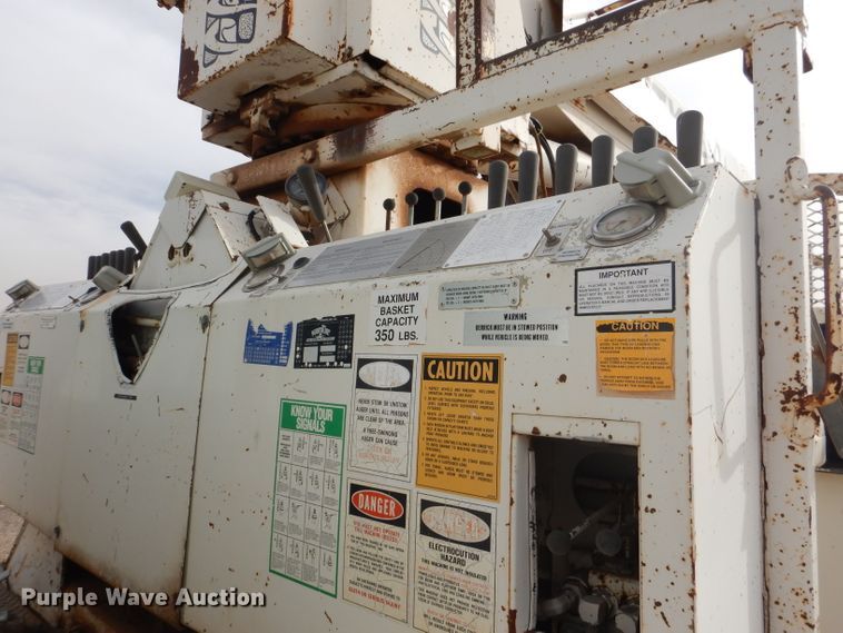 image for item DJ8897 1995 Ford FT900  digger derrick truck