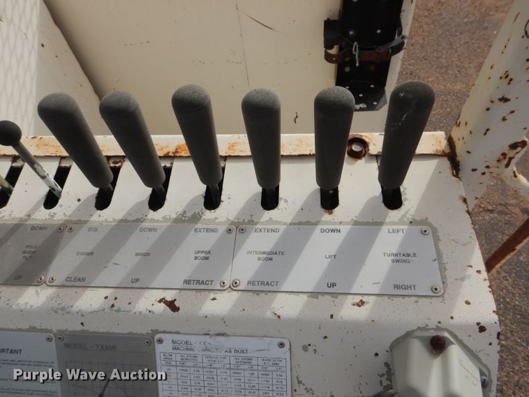 image for item DJ8897 1995 Ford FT900  digger derrick truck