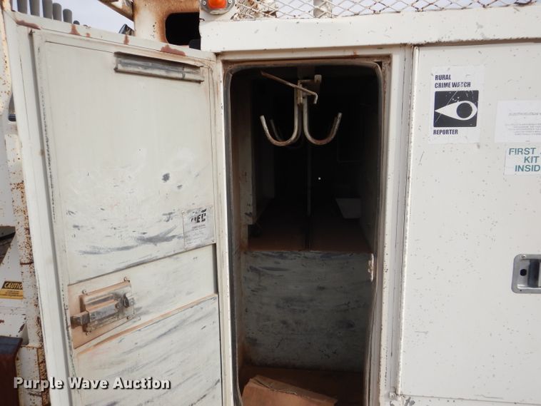 image for item DJ8897 1995 Ford FT900  digger derrick truck