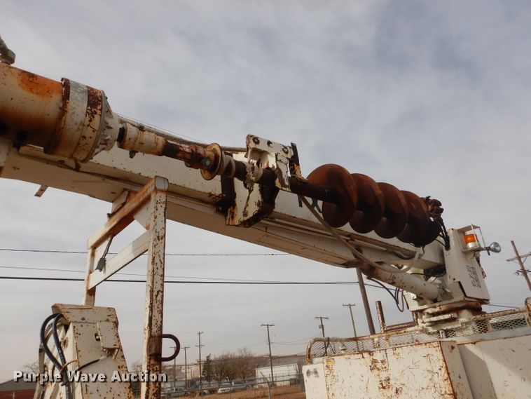 image for item DJ8897 1995 Ford FT900  digger derrick truck