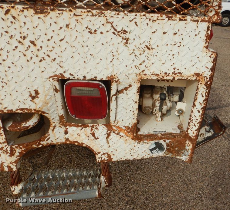 image for item DJ8897 1995 Ford FT900  digger derrick truck