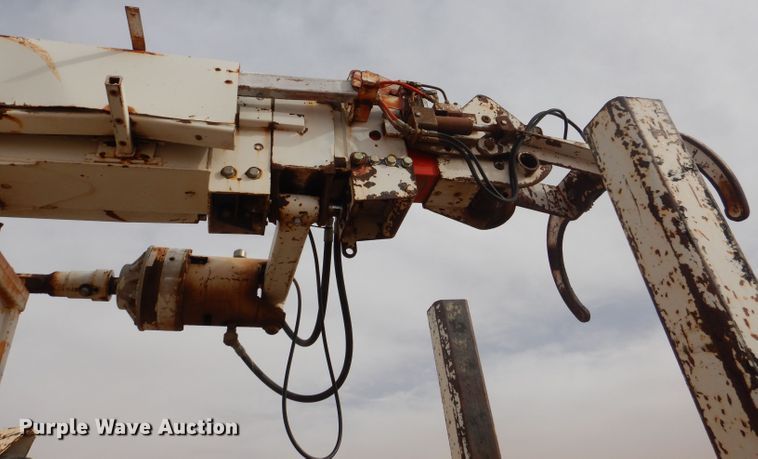 image for item DJ8897 1995 Ford FT900  digger derrick truck