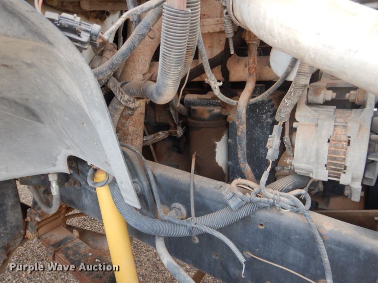 image for item DJ8897 1995 Ford FT900  digger derrick truck