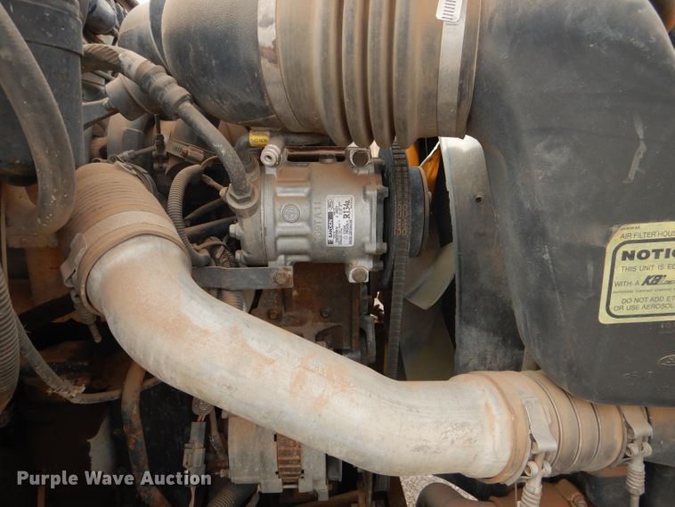 image for item DJ8897 1995 Ford FT900  digger derrick truck