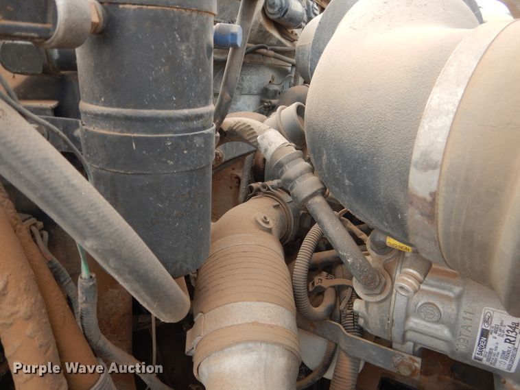 image for item DJ8897 1995 Ford FT900  digger derrick truck