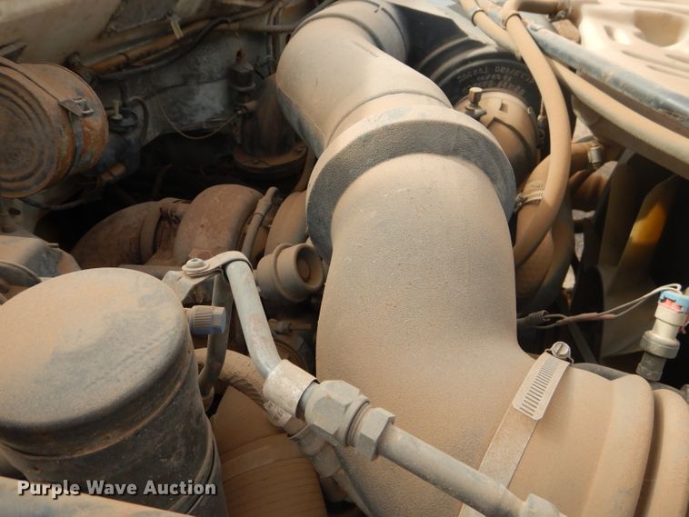 image for item DJ8897 1995 Ford FT900  digger derrick truck